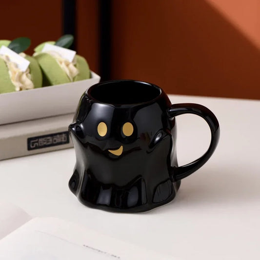 Black Halloween Tea Cup on a white table