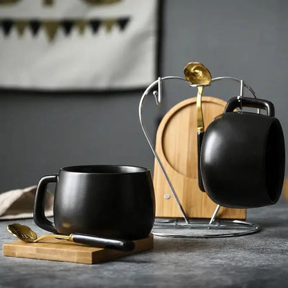 Black Ceramic Mugs on a wooden tray and on a metal tray 