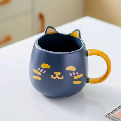 Cute Cat Mug in Navy Blue on a white table
