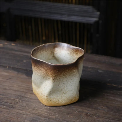 Mexican Ceramic Cup in milky white on a wooden table